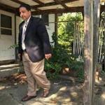 Rob Consalvo, a city councilor running for mayor, visited a neglected house in HydePark.