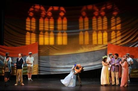 Stephanie Scarcella, as Cenerentola, and Zac Engle, as Prince Ramiro, take center stage in Boston Opera Collaborative’s production of Rossini’s “La Cenerentola” at the Strand Theatre.
