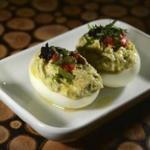 Deviled eggs with tuna and black olives added to the creamy yolk at Oleana. 