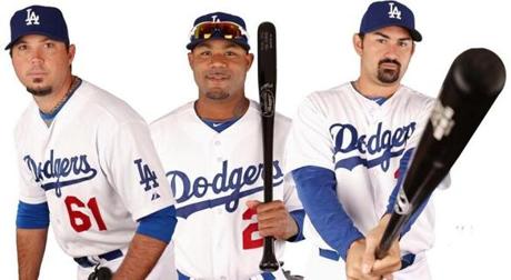 Josh Beckett (left), Carl Crawford (center), and Adrian Gonzalez went from Boston to Los Angeles in last year’s blockbuster nine-player transaction.
