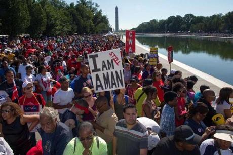 Marchers file towards their seats at the ceremony at the Lincoln Memorial honoring the 50th anniversary of the 1963 March on Washington.
