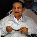 Hosni Mubarak, the former president of Egypt, was led to an ambulance Sunday for a trip to a courtroom in eastern Cairo.