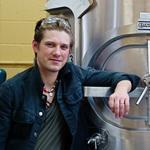 Taylor and Isaac Hanson at the brewery. Hanson’s beer is called Mmmhops,