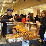 A vendor and his wares in the food court of a Tokyo department store.