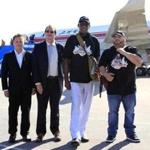 Former NBA star Dennis Rodman (second from right) posed for a photo at Pyongyang airport on Tuesday.