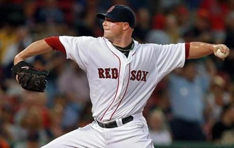 Jon Lester allowed one run through seven innings, and Red Sox relievers held on for the win.
