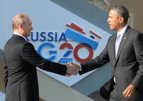 Russian President Vladimir Putin (left) welcomed  President Obama at the start of the G20 summit in Saint Petersburg. Russia.
