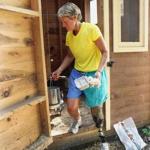 Robin Tarani collected eggs from the chicken coop on her property in Rutland. Tarani has trained daily for the Jimmy Fund Walk, sometimes walking several miles.