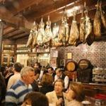 In Seville, the bar at El Rinconcillo is hung with varieties of the famous Spanish hams (jamon); at La Carboneria, a free flamenco show.