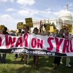 A group against US military action in Syria marched to Capitol Hill on Saturday. 