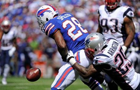 Kyle Arrington knocked the ball away from C.J. Spiller of the Bills, leading to a Patriots touchdown.

