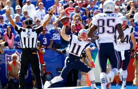 Julian Edelman scored for the Patriots on a pass from Tom Brady in the first quarter.
