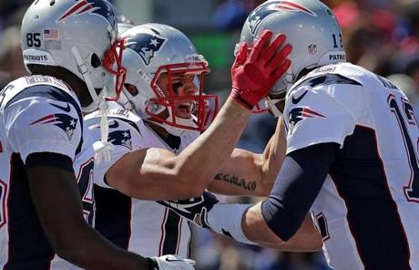 Julian Edelman celebrated his touchdown in the first quarter with Tom Brady.
