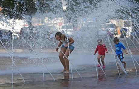 The fountains at the Christian Science Plaza in Boston provided relief from the heat.
