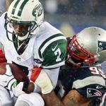 Jets quarterback Geno Smith was sacked by the Patriots’ Tommy Kelly in the third quarter. 