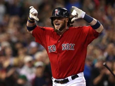 Jarrod Saltalamacchia reacted as he entered the Red Sox dugout after hitting a grand slam in the seventh inning.
