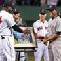The Red Sox’ David Ortiz presented Yankees legend Mariano Rivera with a painting depicting his famous response to the ovation he received at Fenway Park on Opening Day in 2005. 