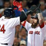 Mike Napoli was met at the plate by David Ortiz after his two-run home run in the first inning.