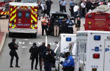 Emergency vehicles and law enforcement personnel responded to a reported shooting at  the Washington Navy Yard.
