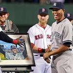 Mariano Rivera smiles when presented with a painting of his response to the ovation he got at Fenway in ’05.