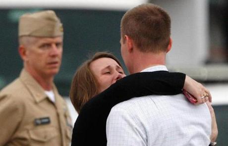 A woman was reunited with her husband, who was one of hundreds of workers evacuated.
