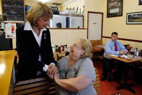 MEDFORD, 8 A.M.: Greeting resident Isabel Shea at Dempsey’s Breakfast and Lunch.
