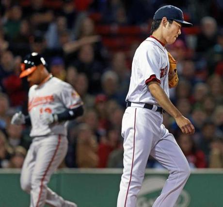 Koji Uehara allowed Alexi Casilla of the Orioles to score on a sacrifice fly in the ninth inning, ending his streak of scoreless innings.
