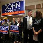 Mayoral candidate John Connolly with wife, Meg, at a rally in West Roxbury on Tuesday.
