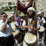 Musicians lead a Bar Mitzvah boy toward the Western Wall in “Jerusalem.”