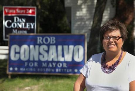 Hyde Park resident Christen Dellorco's sign for mayoral candidate Robert Consalvo vied for attention alongside neighbor Jack Slekis’ sign for rival Daniel Conley.
