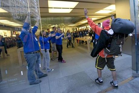 David Zuber of Switzerland was first in line at the Apple Store on Boylston Street for the debut of the new iPhones Friday.

