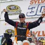 Matt Kenseth celebrated in Victory Lane after winning the Sylvania 300 at New Hampshire Motor Speedway, the second race in NASCAR’s Chase for the Sprint Cup Championship.