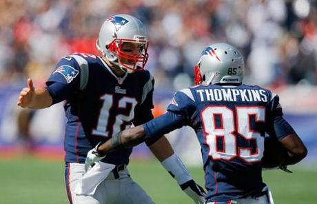 Tom Brady and Kenbrell Thompkins celebrated after Tompkins scored.
