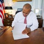 Governor Deval Patrick signed a bill repealing the controversial tech tax.
