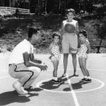 Missie and Bob Cousy, shown with daughters Ticia and Marie, were married for 63 years.