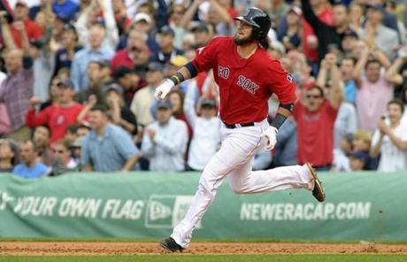 Jarrod Saltalamacchia hit an RBI double in the fifth inning. The Red Sox added three runs to their lead.
