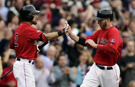 Jacoby Ellsbury (left) celebrated with Stephen Drew, who also scored in the fourth.
