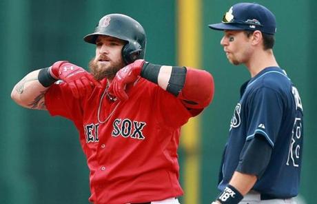 Jonny Gomes pulled his beard after hitting a two-run double in the second inning.
