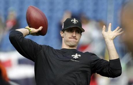 New Orleans Saints quarterback Drew Brees warmed up as he prepared to face the New England Patriots.
