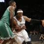 Paul Pierce, now of the Brooklyn Nets, handled the ball against Jeff Green during a pre-season game in New York.