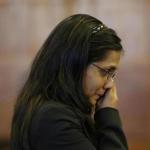 Annie Dookhan wiped tears from her face during a hearing at Suffolk Superior Court in Boston on Friday.
