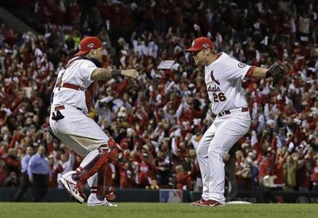 Yadier Molina and Trevor Rosenthal celebrated winning Game 6 of the NLCS and advancing to the World Series.
