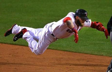 Jonny Gomes slid to second base in the seventh inning.

