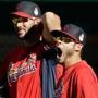 Joe Kelly yawns during the Cardinals' practice Sunday while standing next to fellow pitcher Adam Wainwright.