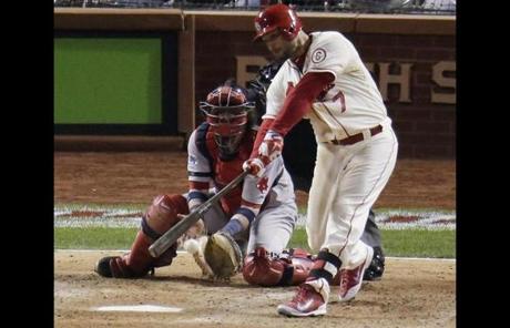 Matt Holliday drove in two runs in the seventh inning, breaking the tie and giving the Cardinals a 4-2 lead.
