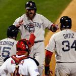 Inserted in the lineup 90 minutes before Game 4, Jonny Gomes belted a three-run homer in the sixth and was greeted by Dustin Pedroia and David Ortiz.