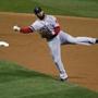 Dustin Pedroia threw to first base for an out in the first inning of Game 5 Monday.