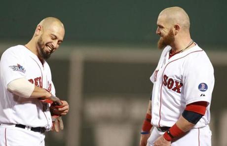 Shane Victorino and Jonny Gomes shared a laugh before the fourth inning.
