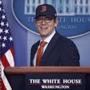 White House press secretary Jay Carney, wearing a Boston Red Sox hat, arrived for the daily press briefing at the White House. 