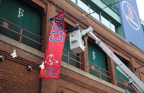A 2013 World Series banner was unveiled at Fenway Park Thursday.
